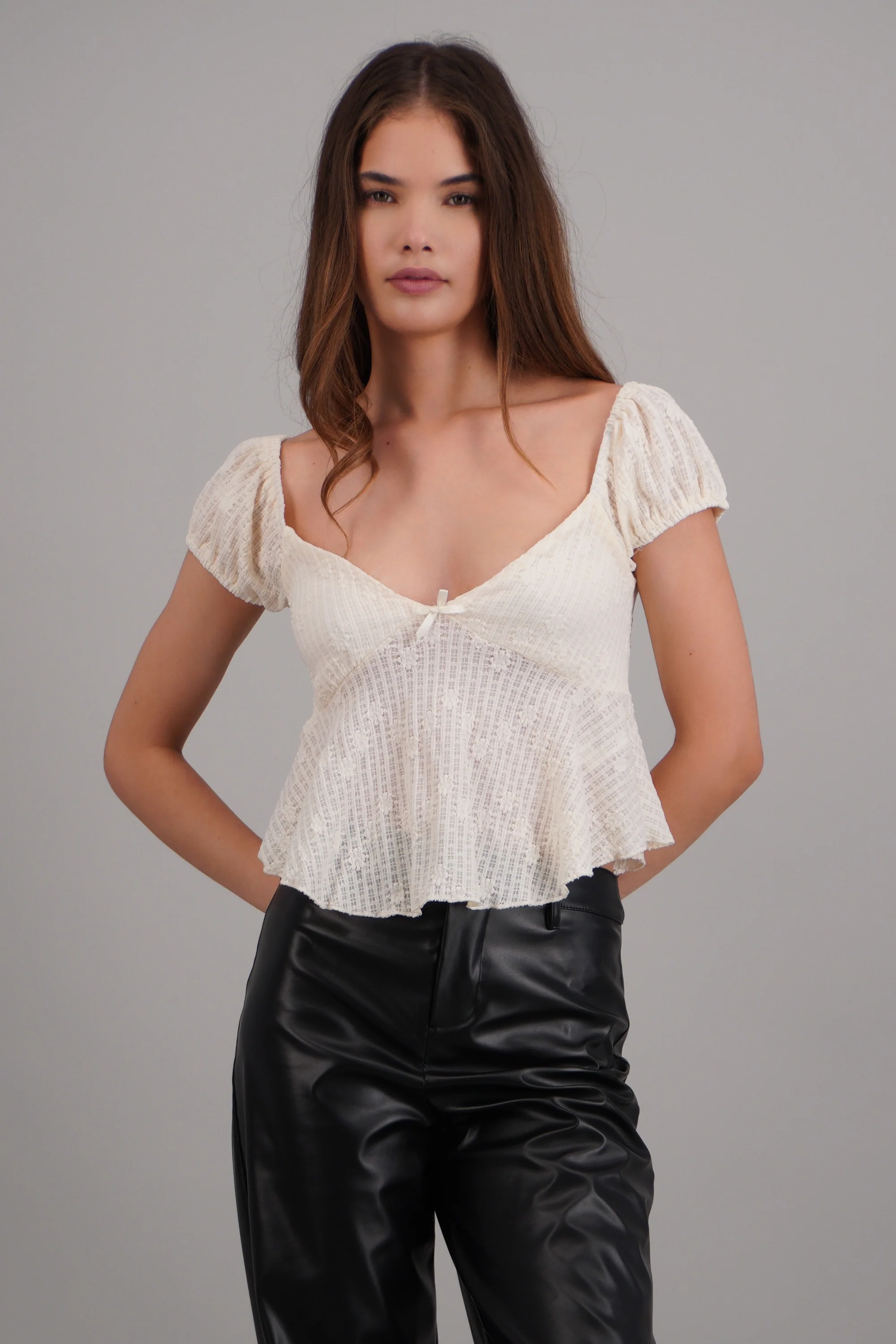Blusa manga corta con detalle mono