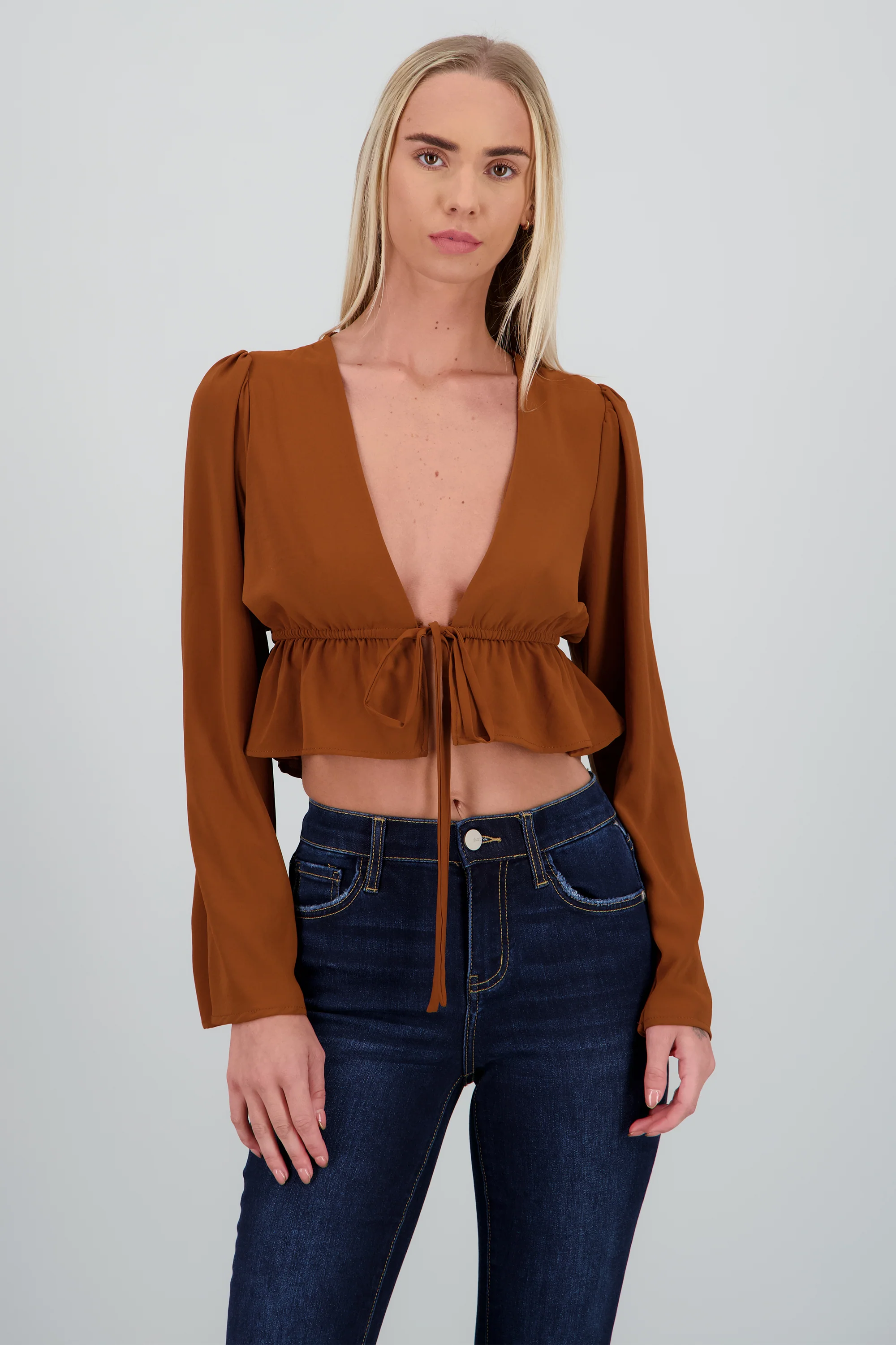 Blusa manga larga detalle amarre