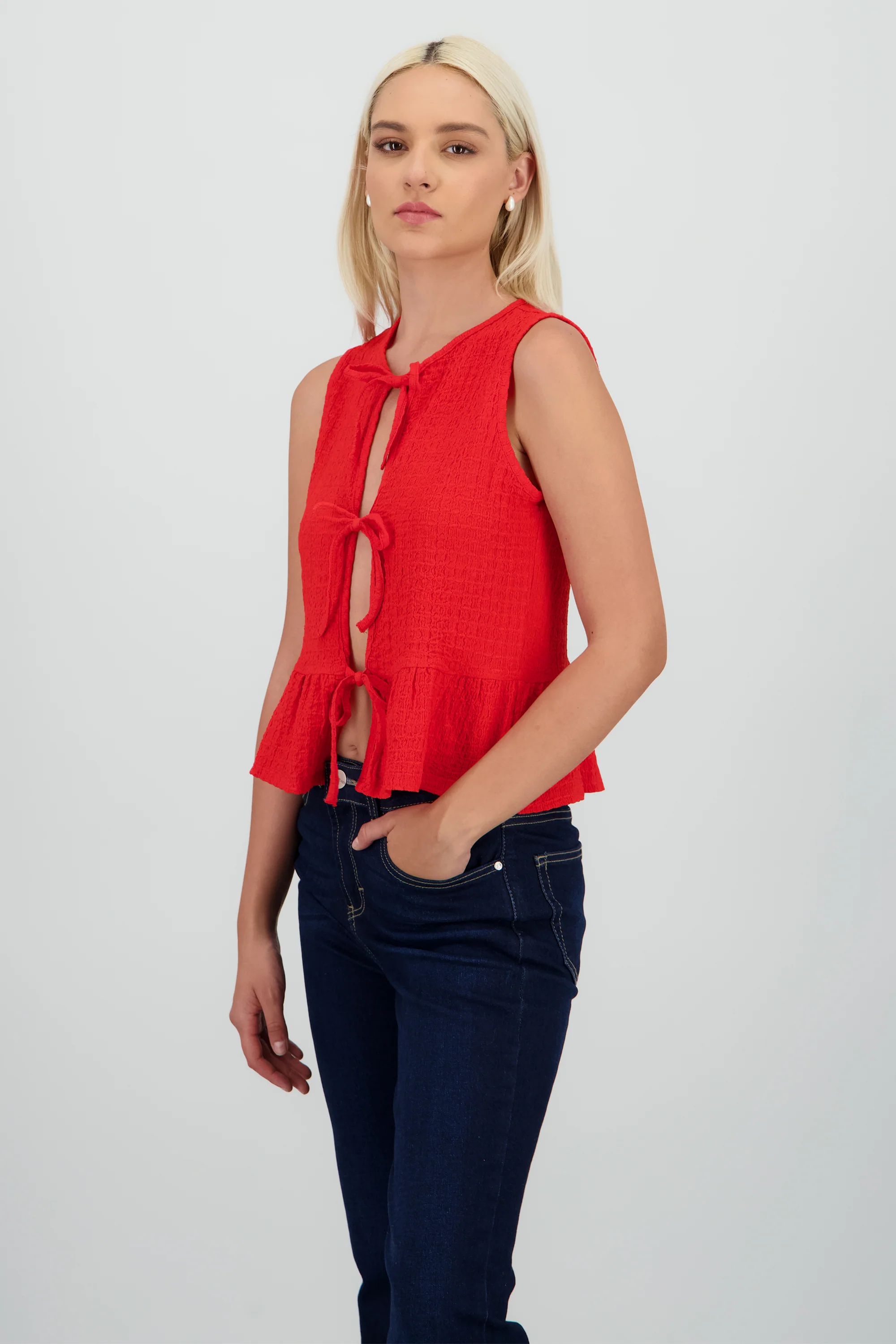 Blusa sin manga con olan y moños - Image 3