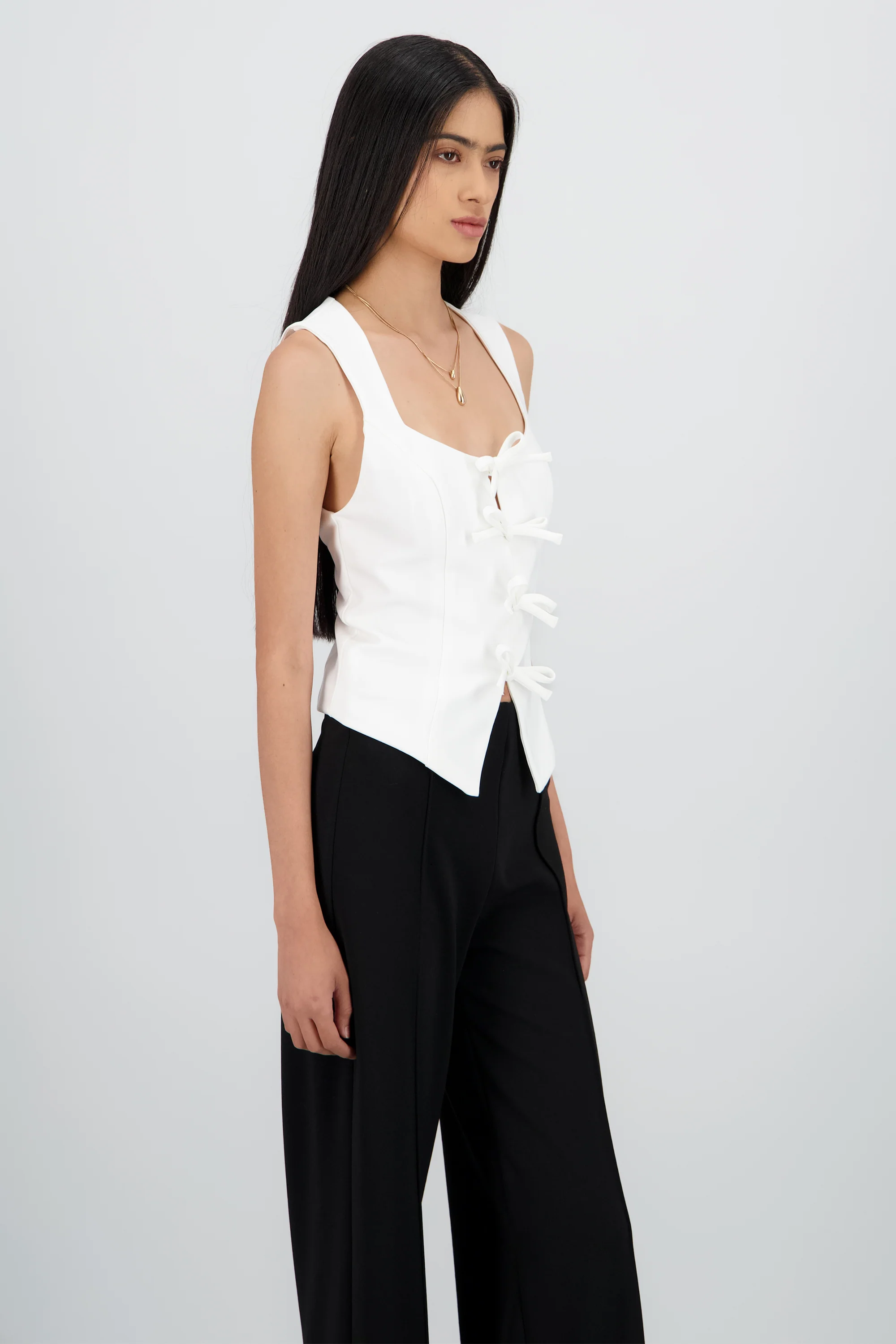 Blusa sin mangas con moños - Image 3