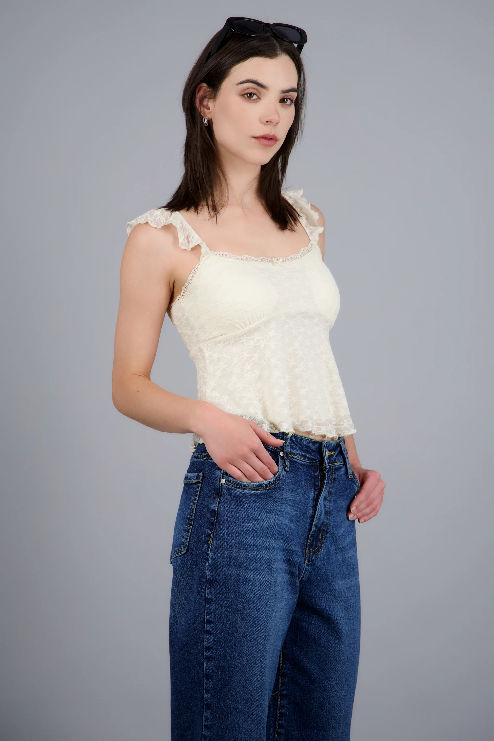 Blusa sin mangas detalle moño con copas - Image 2
