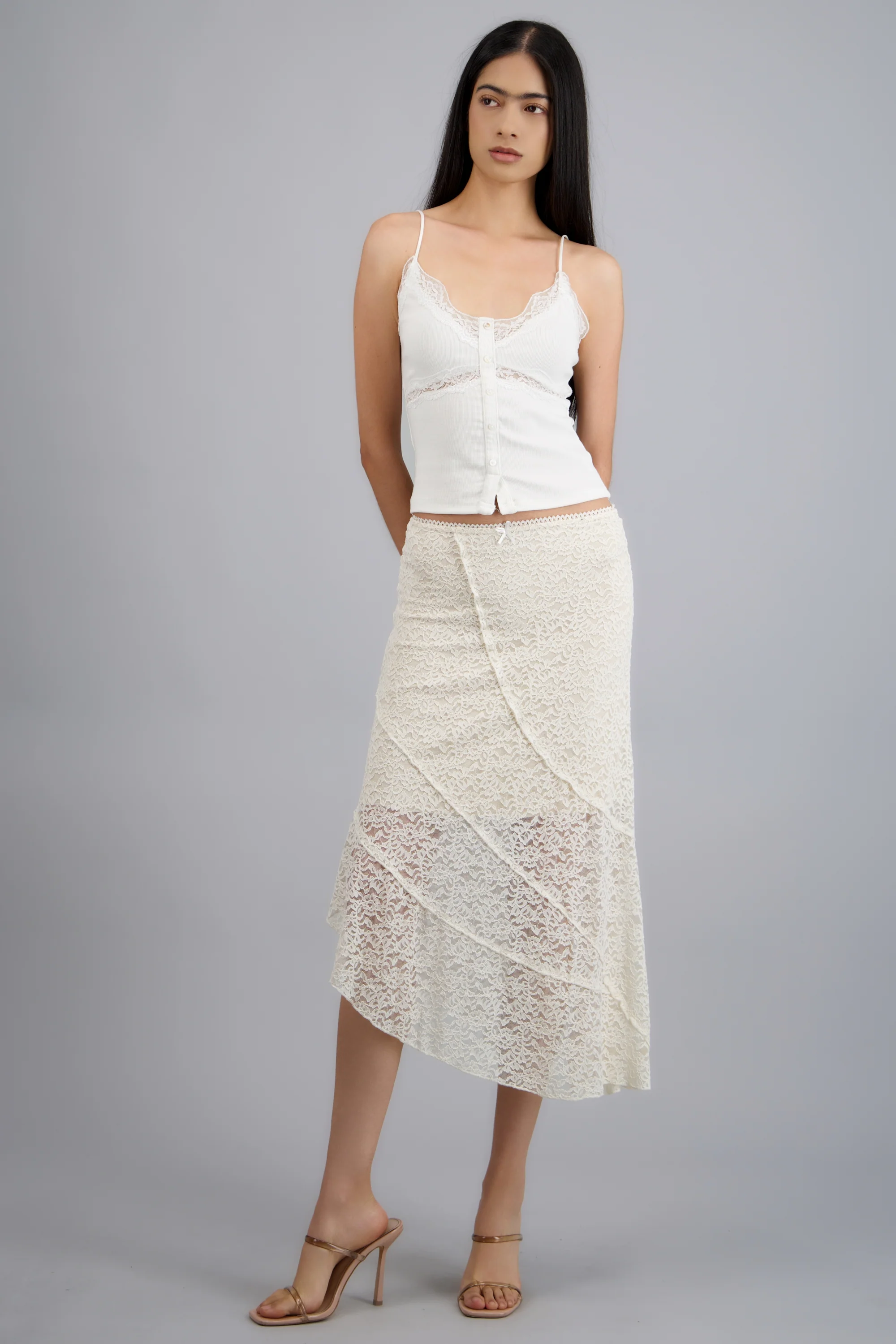Falda midi costuras asimetrica de encaje