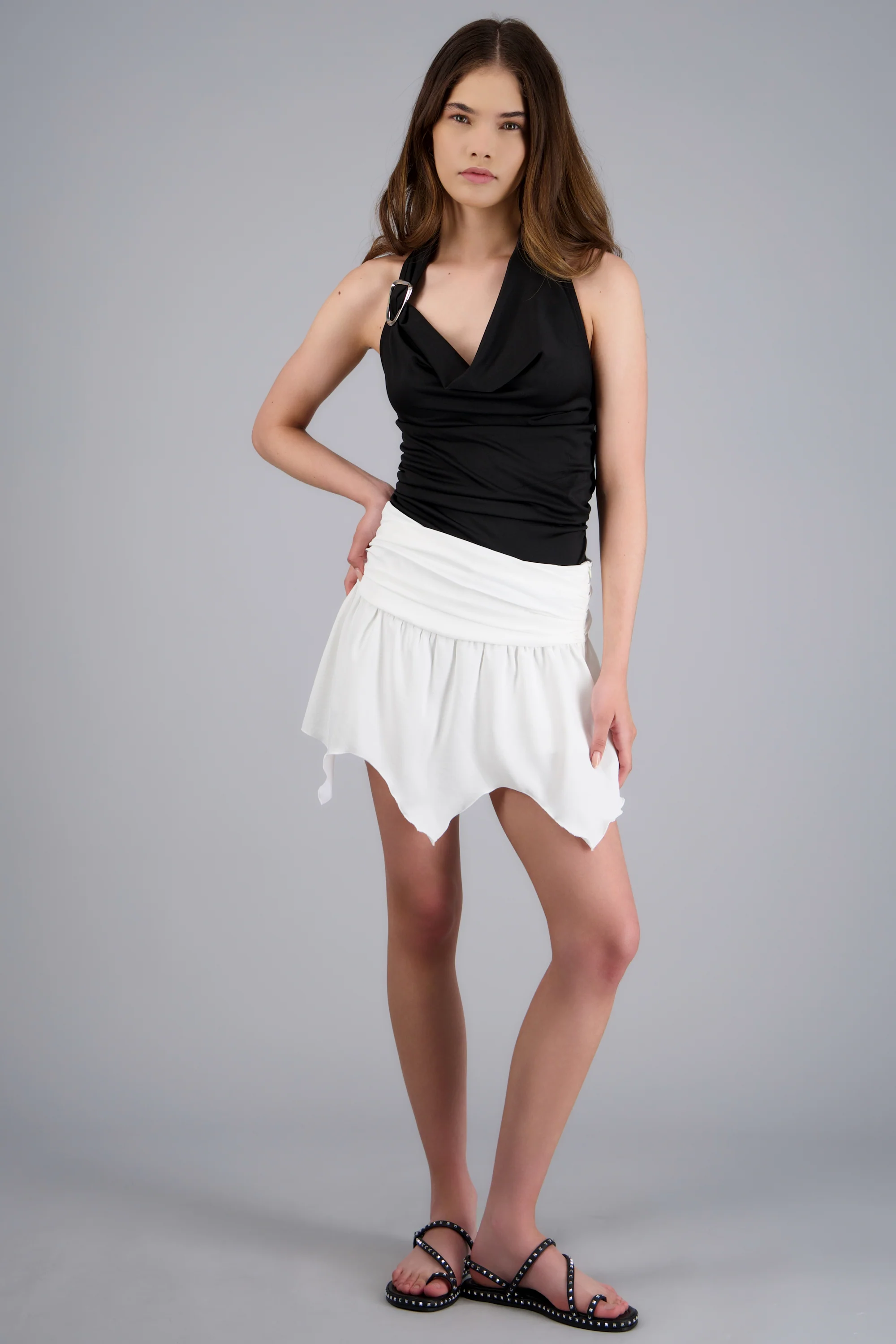 Falda mini detalle plisado