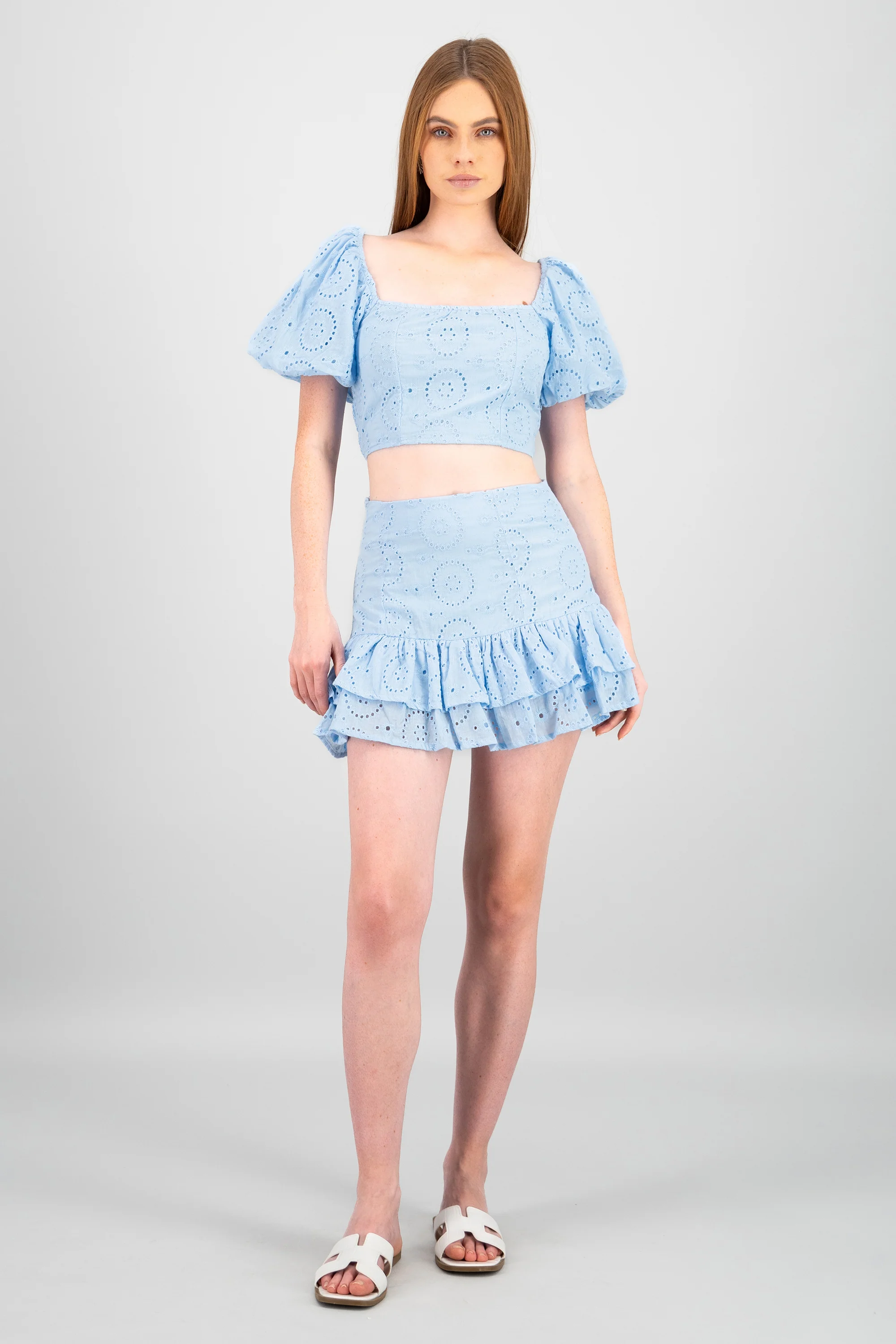 Falda mini olanes textura bordada