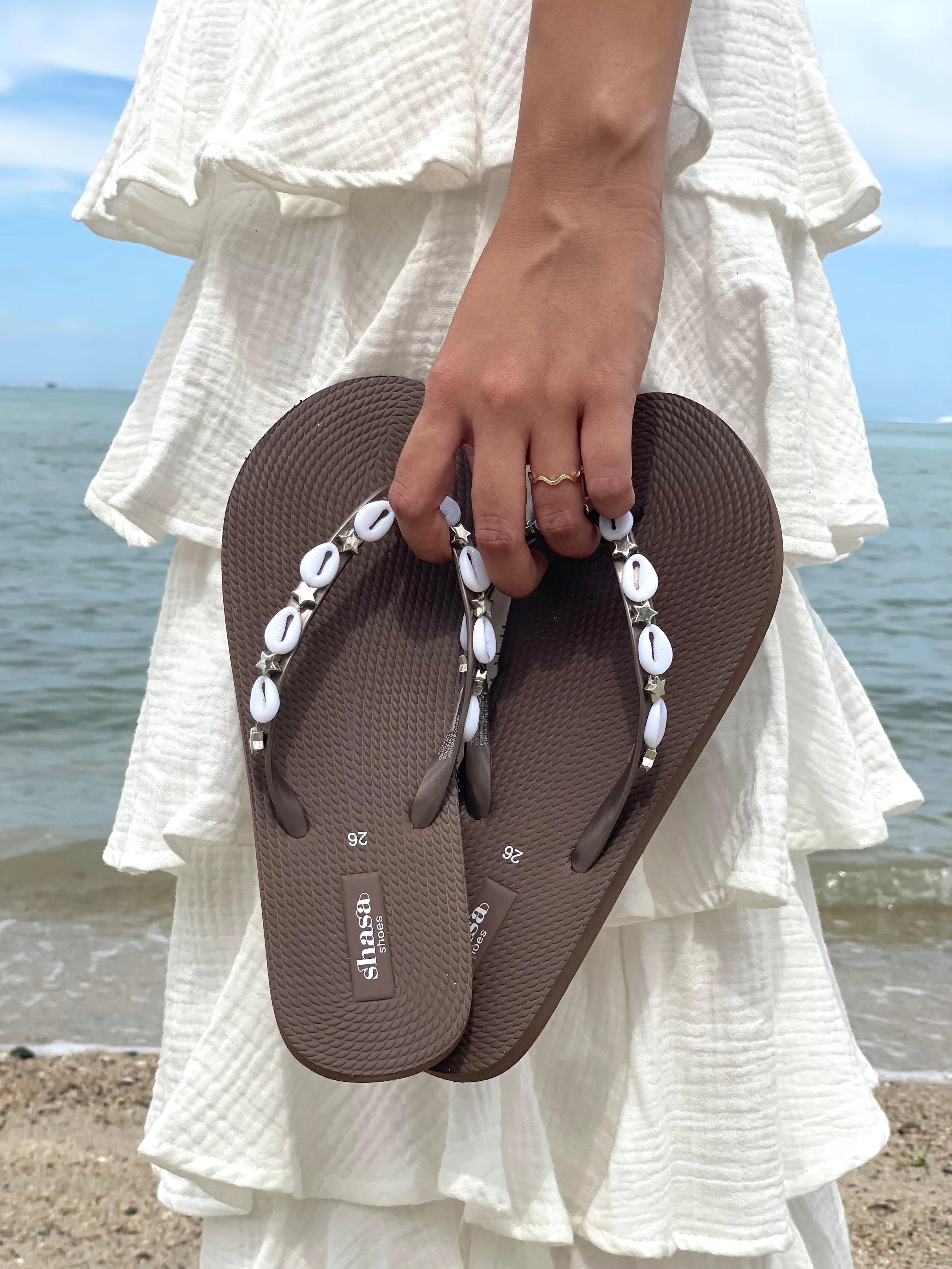 Flip flop conchas marinas