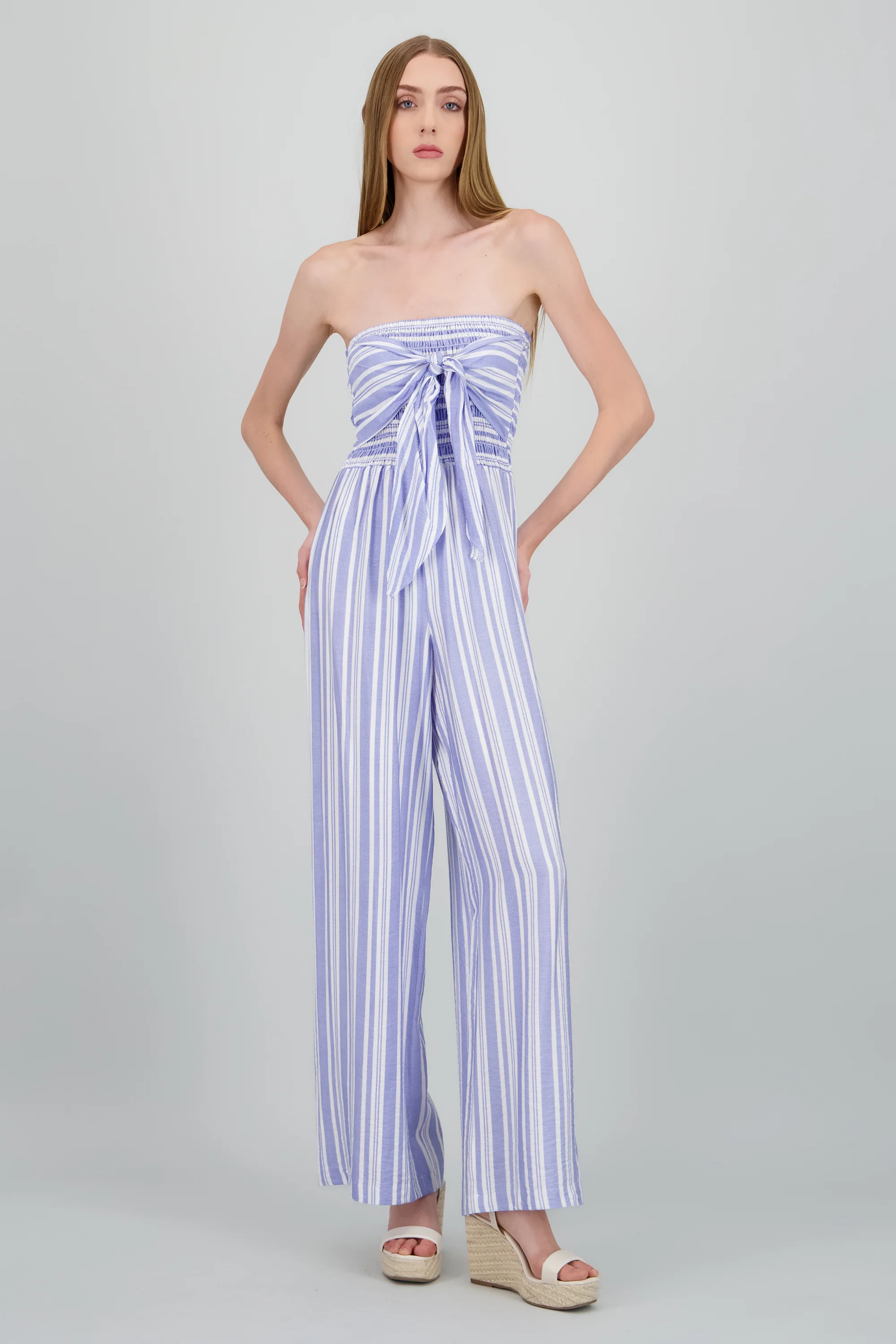 Jumpsuit strapless detalle smock moño