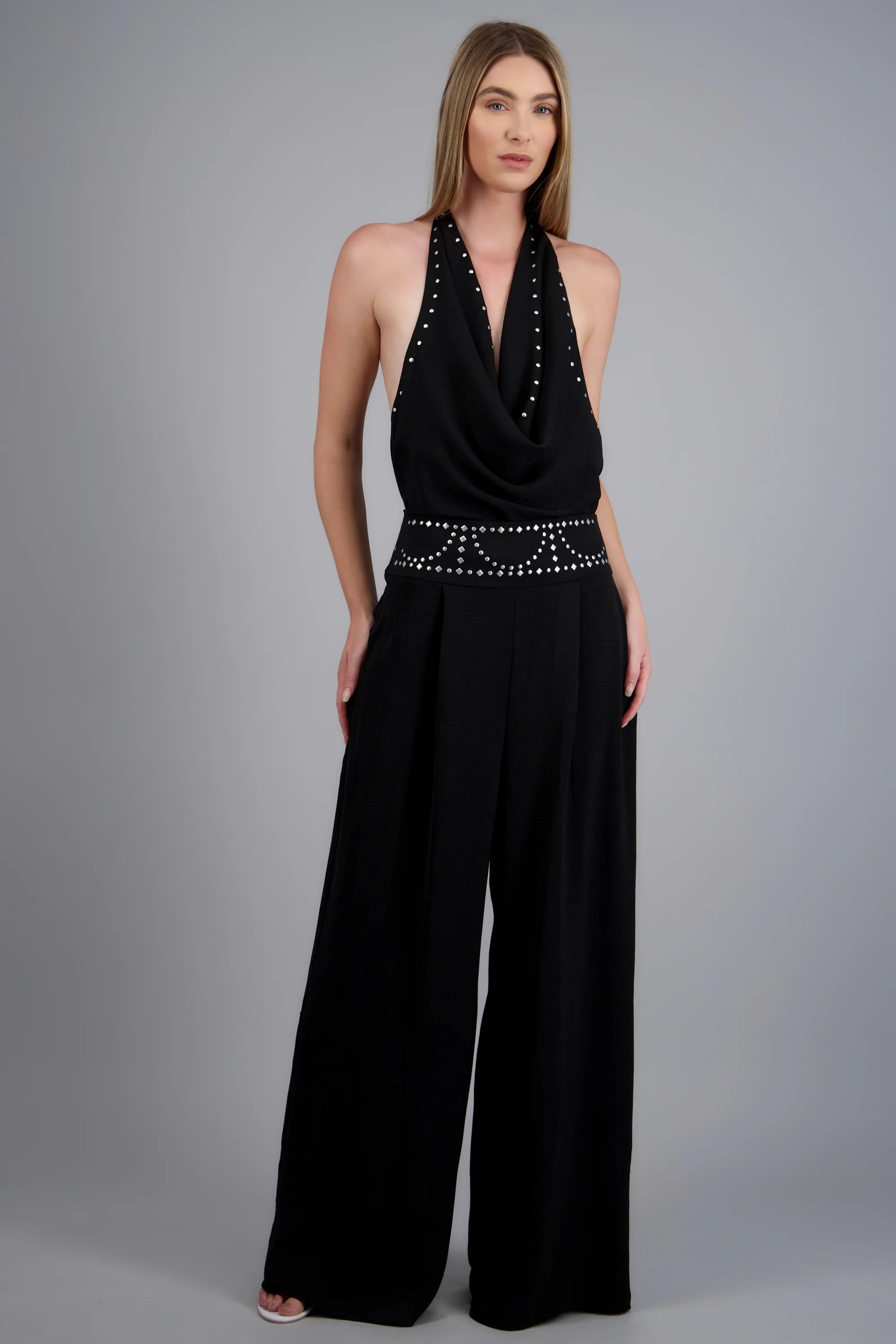 Pantalon detalle pretina con estoperoles