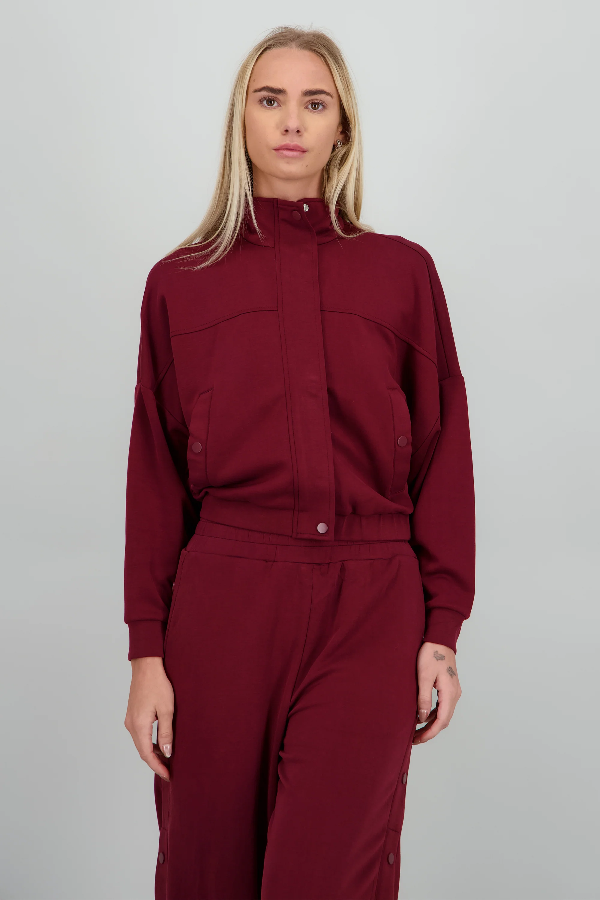 Sudadera con cierre y botones