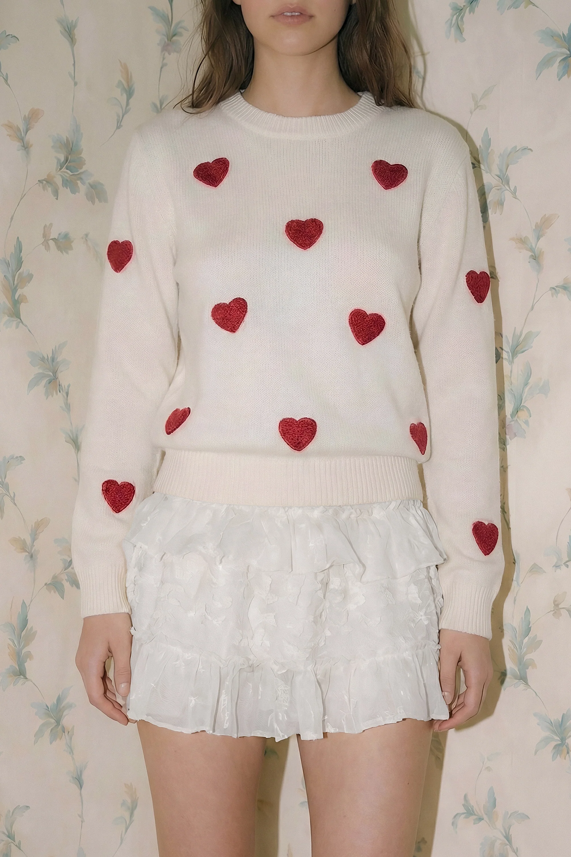 Suéter de corazones