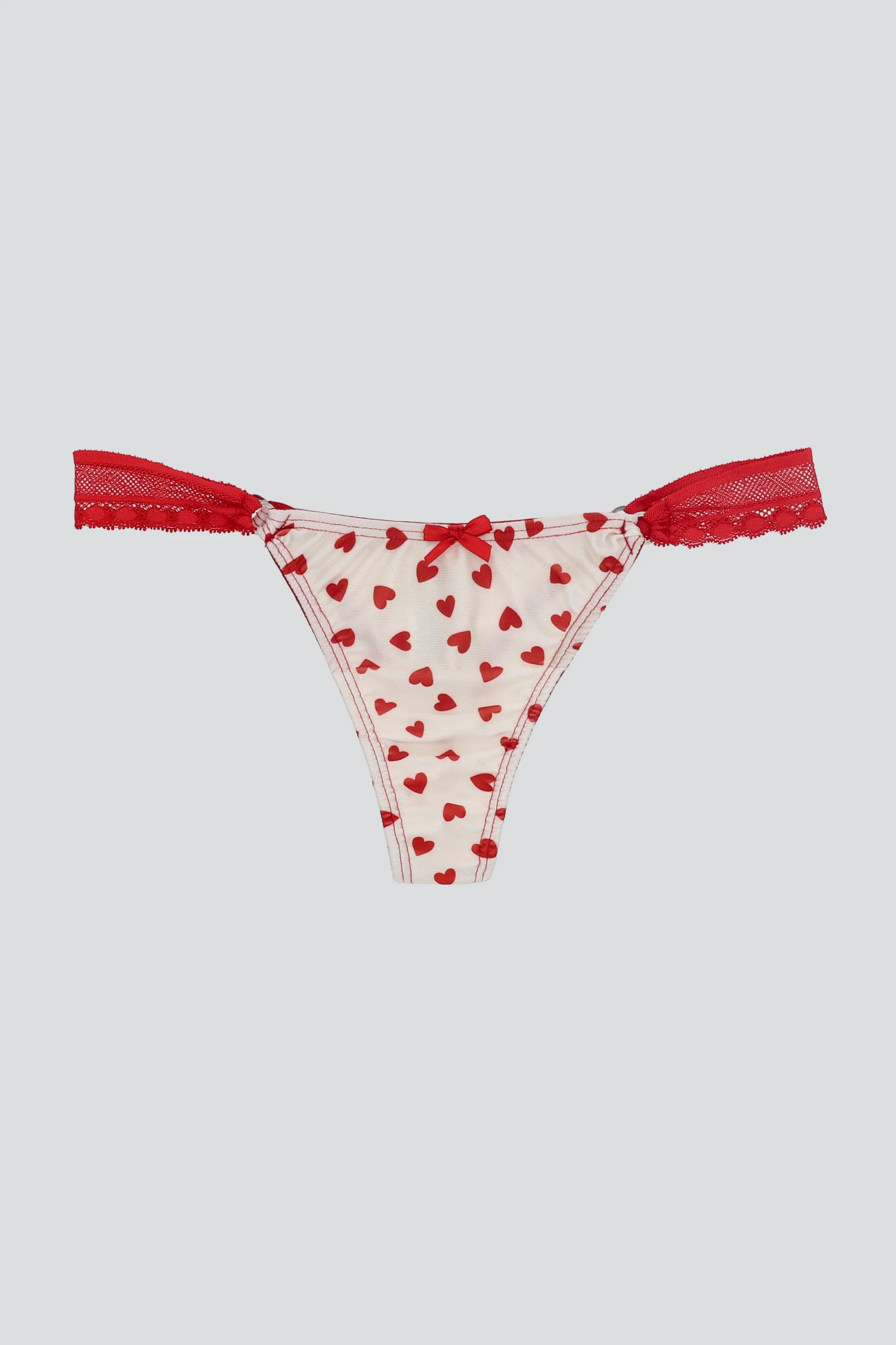 Tanga detalle lateral estampado formas