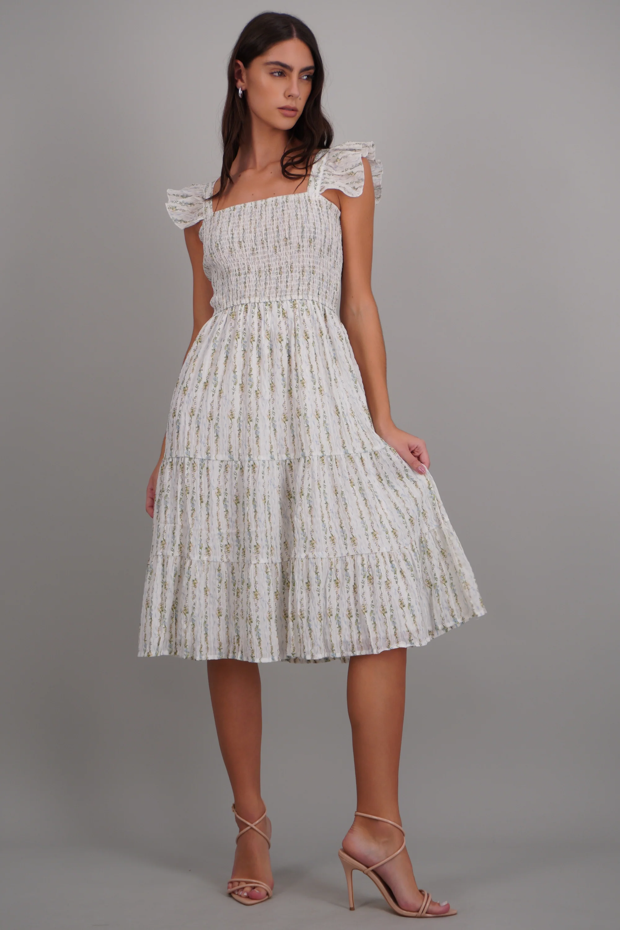 Vestido floreado con manga olán